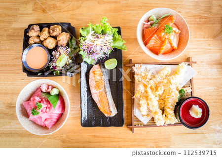 Delicious Japanese Food on Wooden Table 112539715