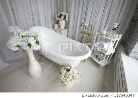 The interior of a beautiful bathroom in a luxurious style. 112540347