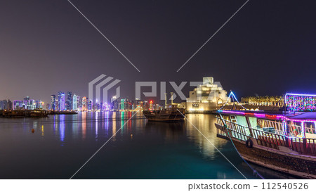 Beautiful Museum of Islamic Art night timelapse hyperlapse in Doha, Qatar. 112540526