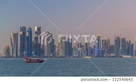 Doha downtown skyline day to night timelapse, Qatar, Middle East Doha downtown skyline day to night timelapse, Qatar, Middle East 112540643