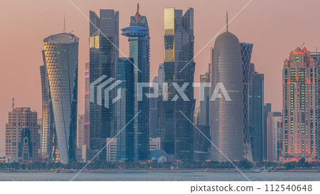 Doha downtown skyline day to night timelapse, Qatar, Middle East 112540648