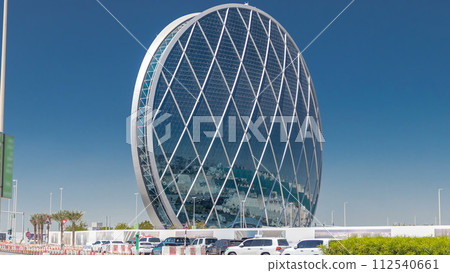 Circular skyscraper Aldar Headquarters Building timelapse in Abu Dhabi, UAE. Circular skyscraper Aldar Headquarters Building timelapse in Abu Dhabi, UAE. 112540661