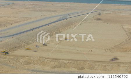 Soil compactor and bulldozer during road construction works timelapse Soil compactor and bulldozer during road construction works timelapse 112540792
