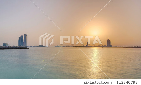 Sunset in Abu Dhabi over Marina Island timelapse Sunset in Abu Dhabi over Marina Island timelapse 112540795