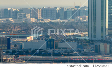 Buildings on Al Reem island in Abu Dhabi timelapse from above. Buildings on Al Reem island in Abu Dhabi timelapse from above. 112540842