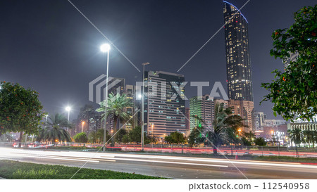 Skyscrapers in Abu Dhabi Skyline at night timelapse, United Arab Emirates 112540958