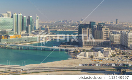 Aerial skyline of Abu Dhabi city centre from above timelapse 112540997