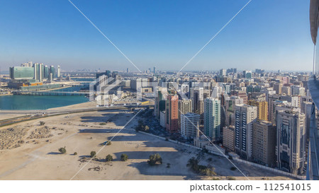 Aerial skyline of Abu Dhabi city centre from above timelapse 112541015