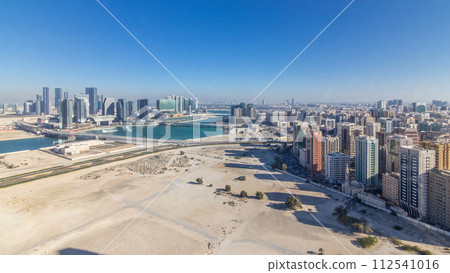 Aerial skyline of Abu Dhabi city centre from above timelapse 112541016