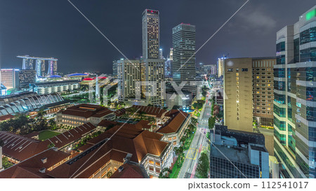 Night panorama with Marina Bay area and skyscrapers city skyline aerial timelapse. 112541017