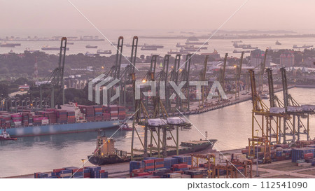 Commercial port of Singapore aerial day to night timelapse. 112541090
