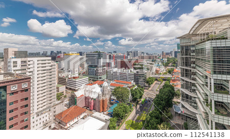 Singapore skyline with Victoria street and National Library aerial timelapse. 112541138