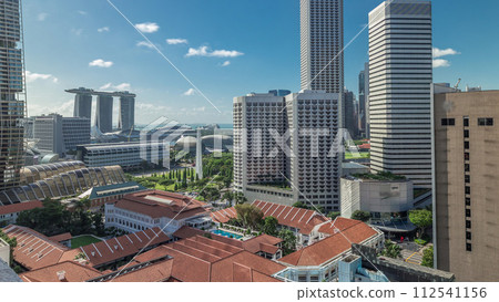A beautiful morning panorama with Marina Bay area and skyscrapers city skyline aerial timelapse hyperlapse. 112541156