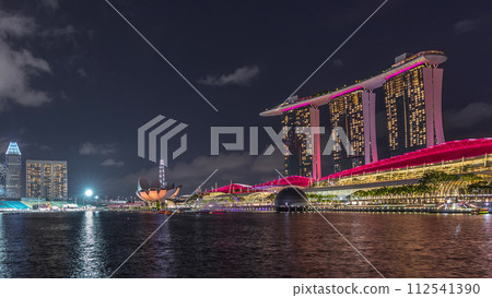 Beautiful laser and musical fountain show at the Marina Bay Sands waterfront in Singapore night timelapse 112541390