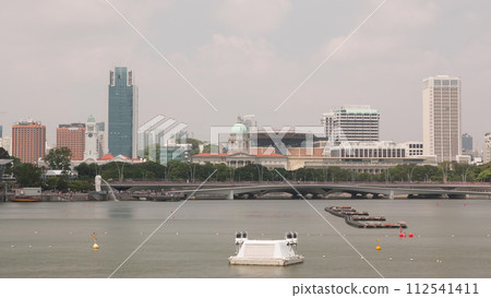 Singapore Merlion Park and Victoria Concert Hall with esplanade bridge timelapse 112541411
