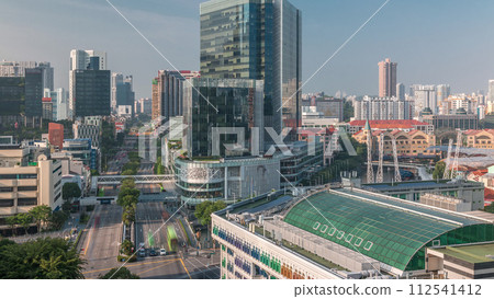Aerial view of traffic on Eu Tong Sen Street and new bridge road all the way to Chinatown timelapse 112541412