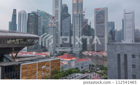 Colorful of Singapore Central business district day to night timelapse cityscape skyline at Marina Bay with Singapore Academy of Law Colorful of Singapore Central business district day to night timelapse cityscape skyline at Marina Bay with Singapore Academy of Law 112541465