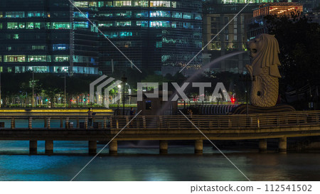 The Merlion fountain and Singapore skyline night to day timelapse. The Merlion fountain and Singapore skyline night to day timelapse. 112541502