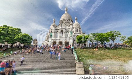 Tourists near the Basilica of the Sacra-Coeur church timelapse hyperlapse. 112541595