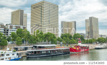 National Library of France timelapse, whose four buildings in the form of open books surround a wooded area. 112541693