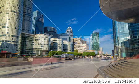 Skyscrapers of La Defense timelapse hyperlapse - Modern business and residential area in the near suburbs of Paris, France. Skyscrapers of La Defense timelapse hyperlapse - Modern business and residential area in the near suburbs of Paris, France. 112541697
