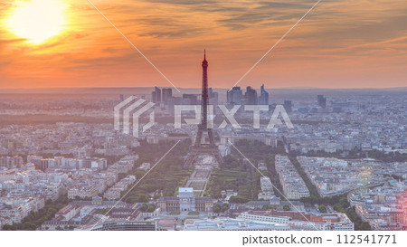 Panorama of Paris at sunset timelapse. Eiffel tower view from montparnasse building in Paris - France Panorama of Paris at sunset timelapse. Eiffel tower view from montparnasse building in Paris - France 112541771