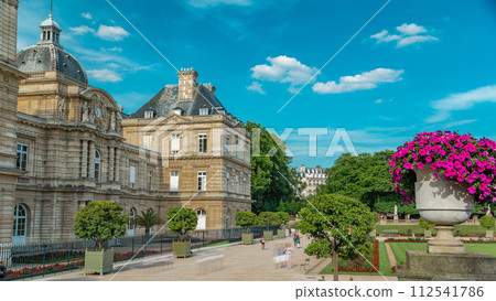 Luxembourg Palace and park timelapse hyperlapse in Paris, France. Luxembourg Palace and park timelapse hyperlapse in Paris, France. 112541786