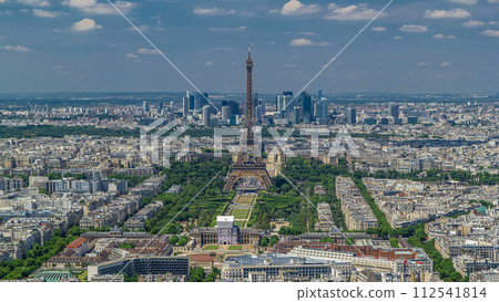 Aerial view from Montparnasse tower with Eiffel tower and La Defense district on background timelapse in Paris, France. 112541814