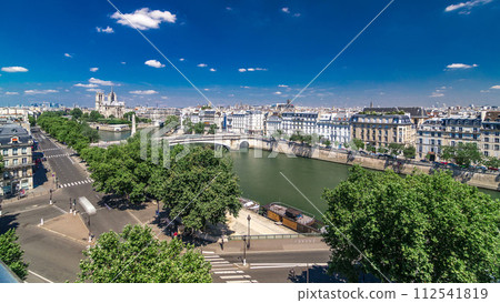 Panorama of Paris timelapse. View from Arab World Institute Institut du Monde Arabe building. France. Panorama of Paris timelapse. View from Arab World Institute Institut du Monde Arabe building. France. 112541819