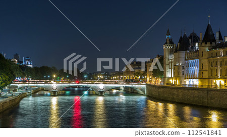 Cite island view with Conciergerie Castle and Pont au Change, over the Seine river timelapse. France, Paris Cite island view with Conciergerie Castle and Pont au Change, over the Seine river timelapse. France, Paris 112541841