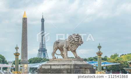 One of the two marble lions of the Tuileries garden overhanging the Concorde place in Paris timelapse 112541868