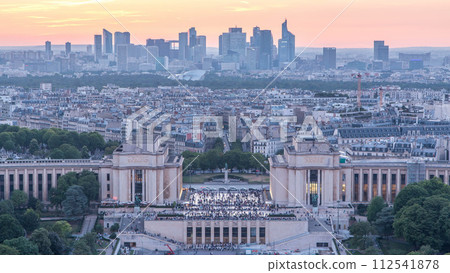 Aerial view over Trocadero day to night timelapse with the Palais de Chaillot seen from the Eiffel Tower in Paris, France. 112541878