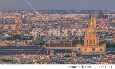 Aerial view of a large city skyline at sunset timelapse. Top view from the Eiffel tower. Paris, France. Aerial view of a large city skyline at sunset timelapse. Top view from the Eiffel tower. Paris, France. 112541943