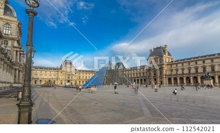 The large glass pyramid and the main courtyard of the Louvre Museum timelapse hyperlapse. Paris, France 112542021