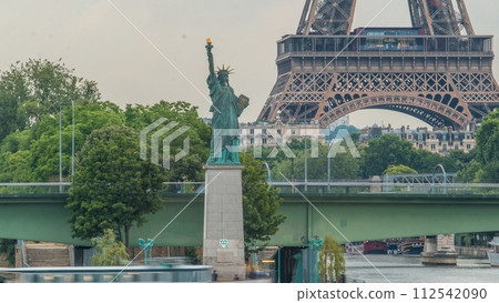 The Statue of Liberty and the Eiffel Tower Timelapse. Paris, France The Statue of Liberty and the Eiffel Tower Timelapse. Paris, France 112542090