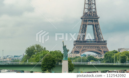 The Statue of Liberty and the Eiffel Tower Timelapse. Paris, France The Statue of Liberty and the Eiffel Tower Timelapse. Paris, France 112542092