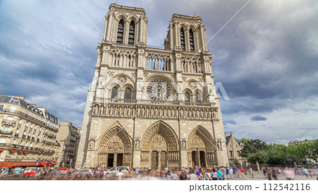Front view of Notre-Dame de Paris timelapse hyperlapse, a medieval Catholic cathedral on the Cite Island in Paris, France 112542116