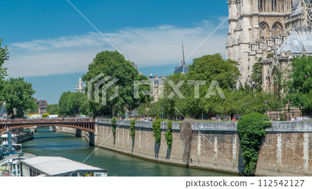 Seine with Double Bridge and Notre Dame de Paris timelapse. One of the most famous symbols of Paris Seine with Double Bridge and Notre Dame de Paris timelapse. One of the most famous symbols of Paris 112542127