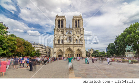 Front view of Notre-Dame de Paris timelapse hyperlapse, a medieval Catholic cathedral on the Cite Island in Paris, France 112542135