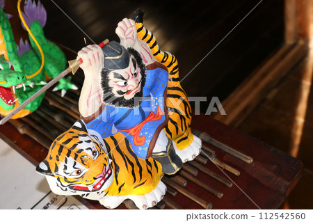 A doll of Shoki-sama riding a tiger from the Hanamaki doll folk tale. A doll of Shoki-sama riding a tiger from the Hanamaki doll folk tale. 112542560