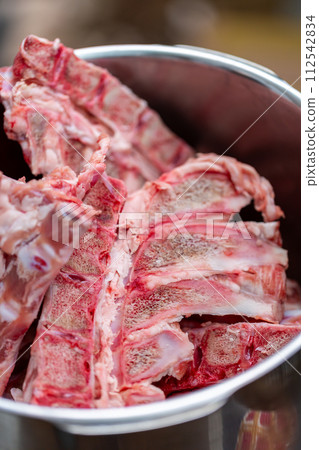 Bone and cartilage waste from butcher shops - dog food 112542834
