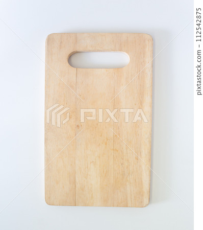 Wooden cutting board in top view, closed up shot on white background. 112542875