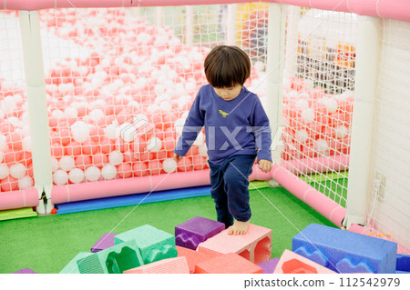 A boy playing around cheerfully 112542979