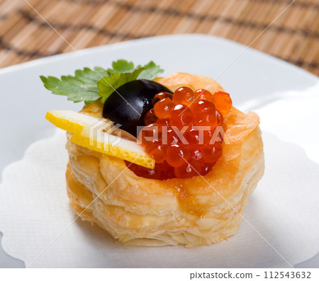 Canapes with red caviar Canapes with red caviar 112543632