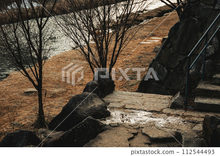 Metoba River flowing next to Nawate Street and Matsumoto cityscape [evening view] 112544493