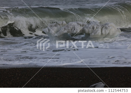Winter scenery, drift ice, on the north coast. 112544753
