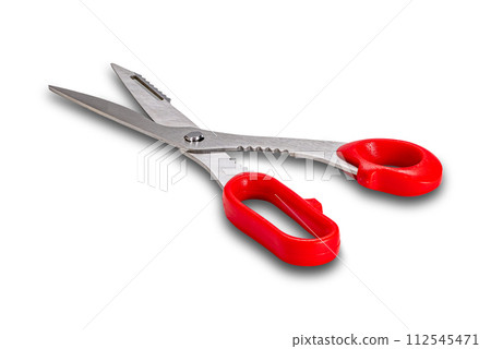 High angle view a pair of metal with red plastic handle kitchen scissors.. 112545471
