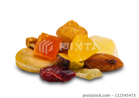 Closeup view pile of mix fruit and nuts isolated on white background. 112545473