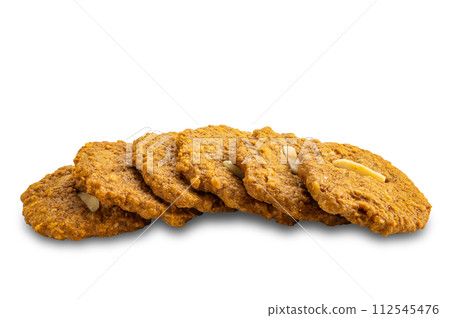 High angle view pile of crispy delicious coconut cookies. High angle view pile of crispy delicious coconut cookies. 112545476