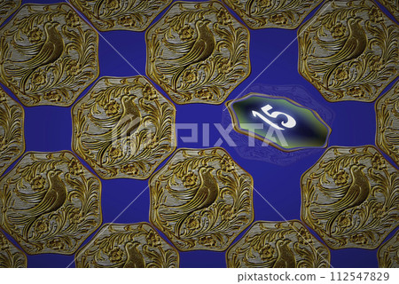 Decorative honeycomb board.A honeycomb of cells with an image of a firebird, with numbers on the reverse side. Logic game. 112547829